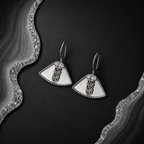 Close-up of Sterling Silver Triana Elegance Earrings turquoise-blue stone detail