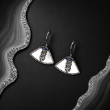Sterling Silver Triana Elegance Earrings styled, turquoise-blue drop earring worn